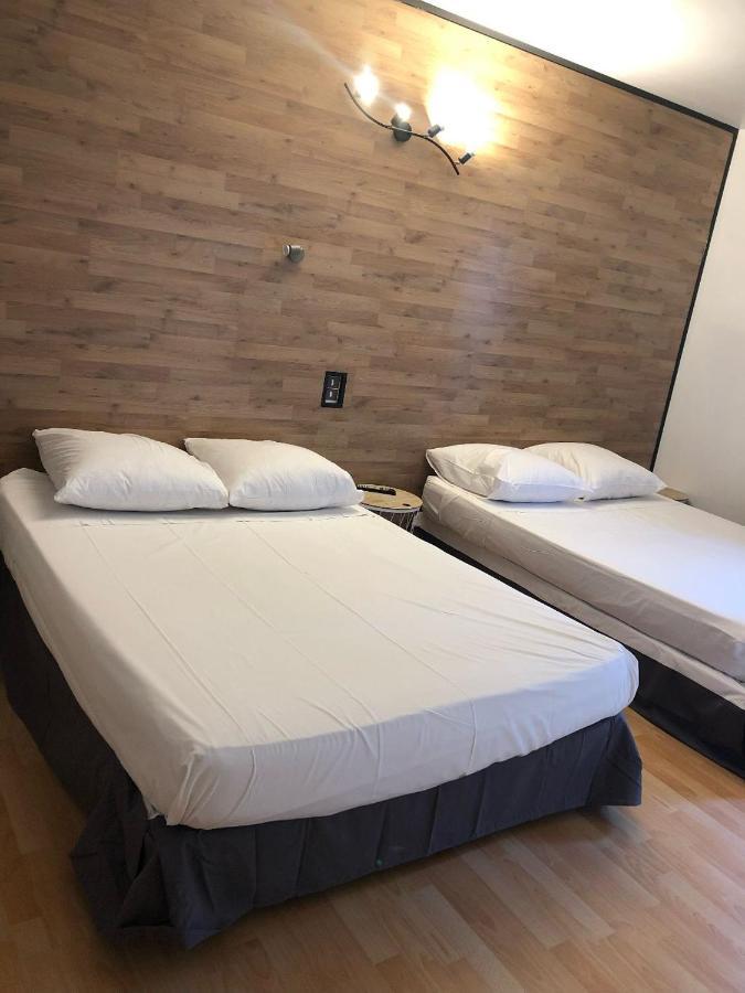 Hotel La Garenne Tresserre Bagian luar foto